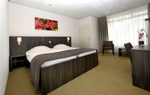 Imagen de la habitación del Hotel De Koekoekshof. Foto 2