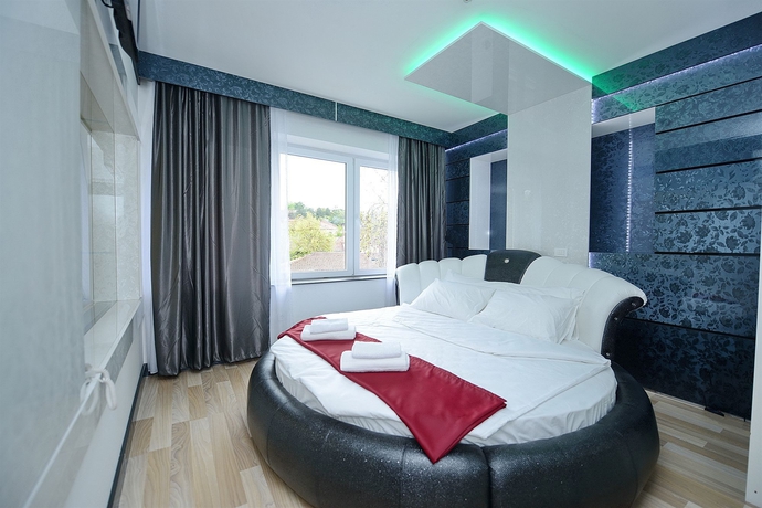 Imagen de la habitación del Hotel De Koka. Foto 12