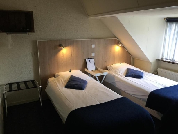 Imagen de la habitación del Hotel De Koningsherberg. Foto 9