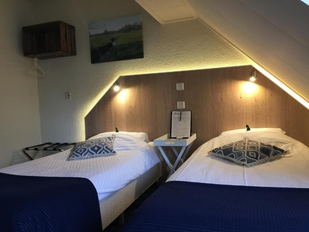 Imagen de la habitación del Hotel De Koningsherberg. Foto 10