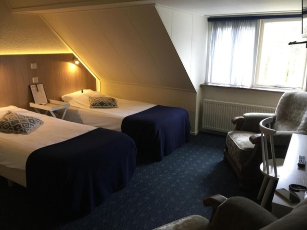 Imagen de la habitación del Hotel De Koningsherberg. Foto 11