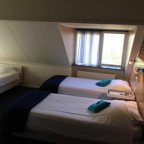 Imagen de la habitación del Hotel De Koningsherberg. Foto 12