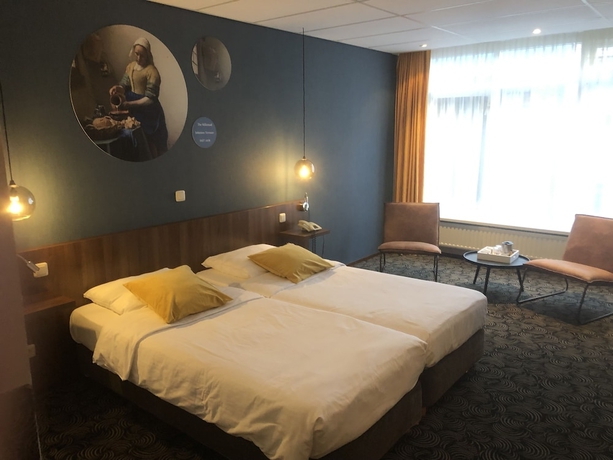 Imagen de la habitación del Hotel De Koophandel. Foto 7