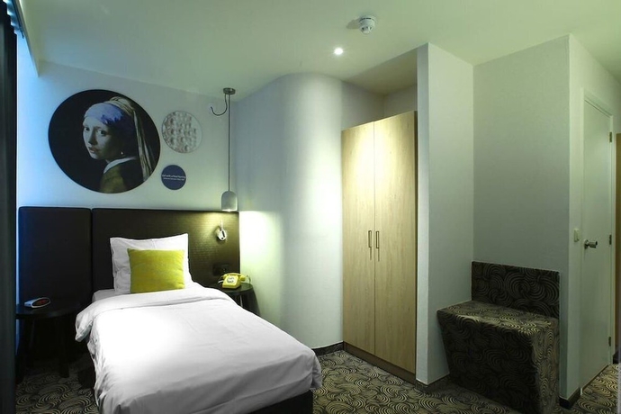 Imagen de la habitación del Hotel De Koophandel. Foto 9