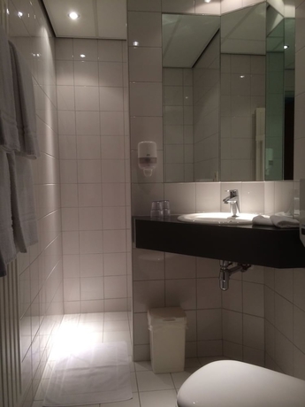 Imagen de la habitación del Hotel De Koophandel. Foto 10