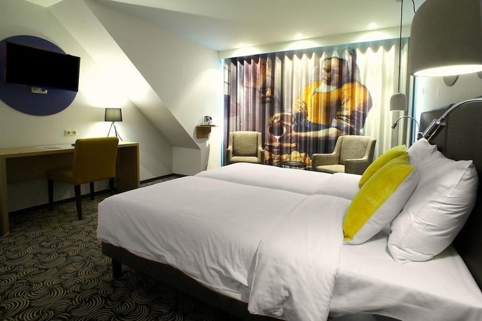 Imagen de la habitación del Hotel De Koophandel. Foto 13