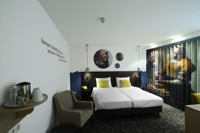 Imagen de la habitación del Hotel De Koophandel. Foto 16