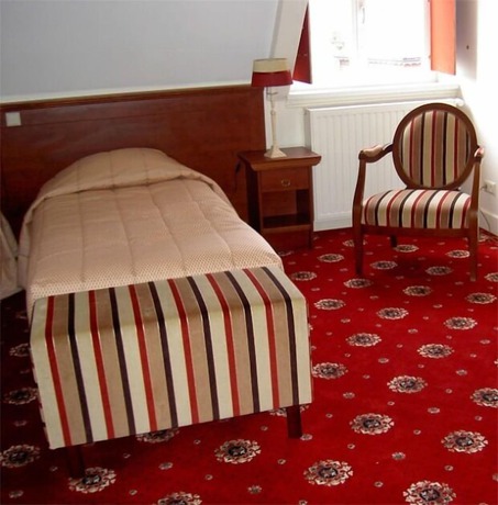 Imagen de la habitación del Hotel De Kroon. Foto 4