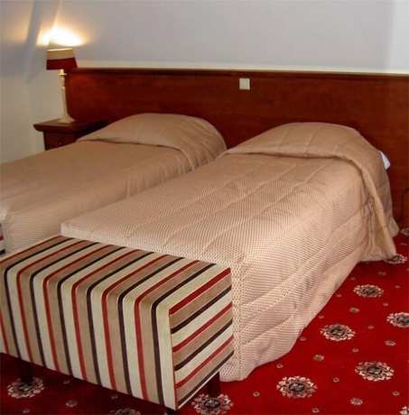 Imagen de la habitación del Hotel De Kroon. Foto 7