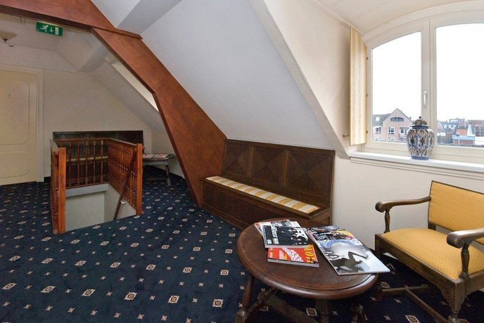 Imagen de la habitación del Hotel De Kroon. Foto 8