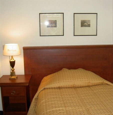 Imagen de la habitación del Hotel De Kroon. Foto 9