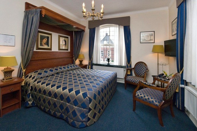 Imagen de la habitación del Hotel De Kroon. Foto 10