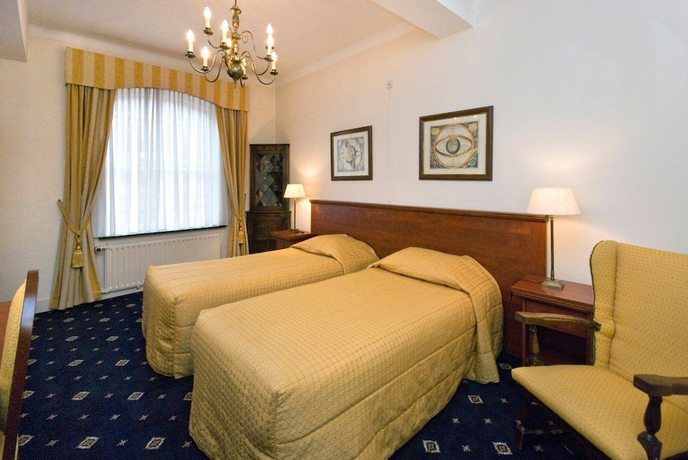 Imagen de la habitación del Hotel De Kroon. Foto 12