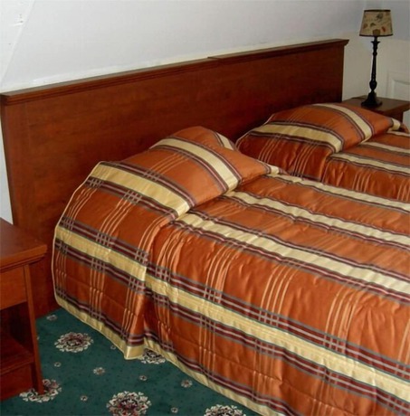 Imagen de la habitación del Hotel De Kroon. Foto 15