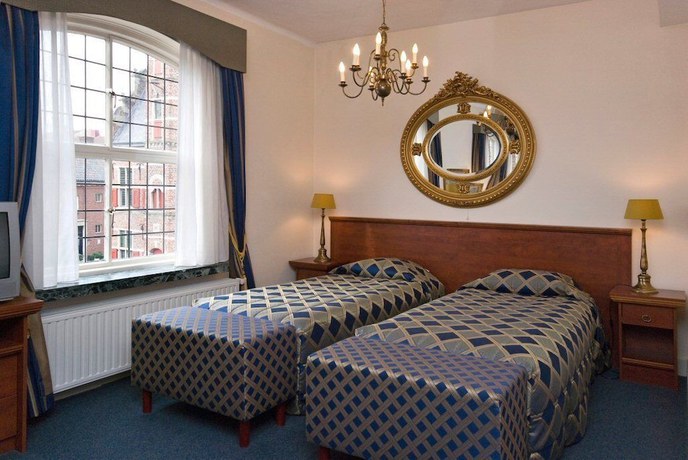 Imagen de la habitación del Hotel De Kroon. Foto 16