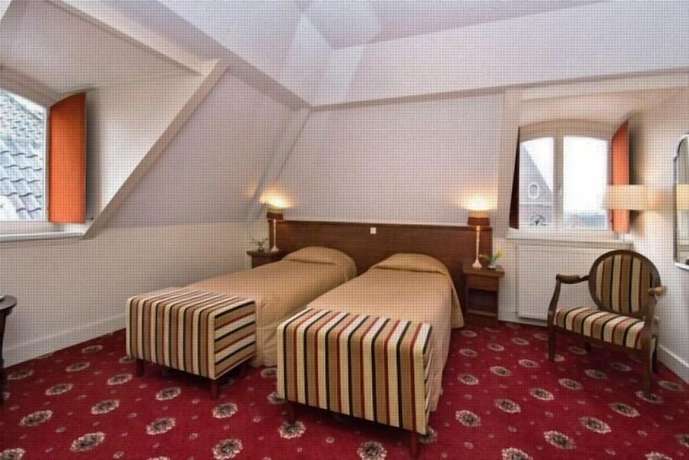 Imagen de la habitación del Hotel De Kroon. Foto 17