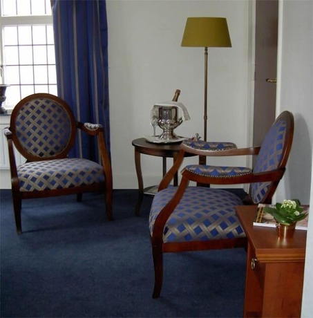 Imagen de la habitación del Hotel De Kroon. Foto 18