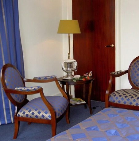 Imagen de la habitación del Hotel De Kroon. Foto 19