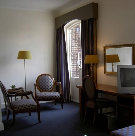 Imagen de la habitación del Hotel De Kroon. Foto 20