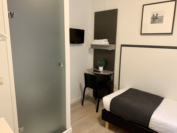 Imagen de la habitación del Hotel De La Bourse. Foto 8