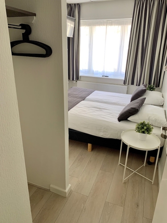 Imagen de la habitación del Hotel De La Bourse. Foto 9