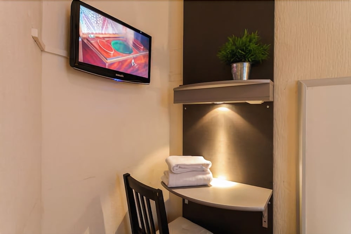 Imagen de la habitación del Hotel De La Bourse. Foto 13