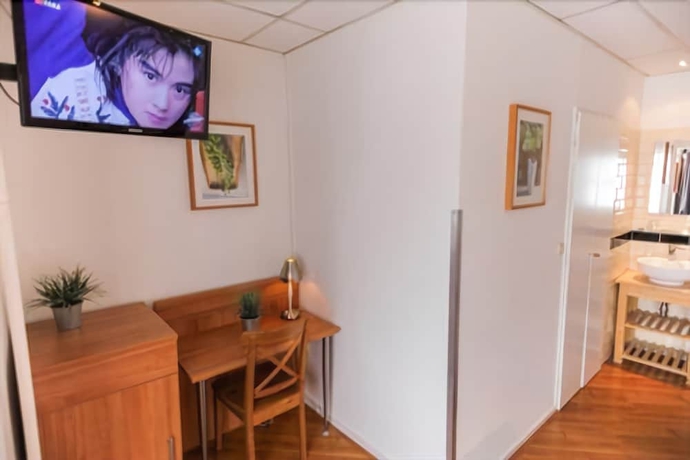 Imagen de la habitación del Hotel De La Bourse. Foto 14