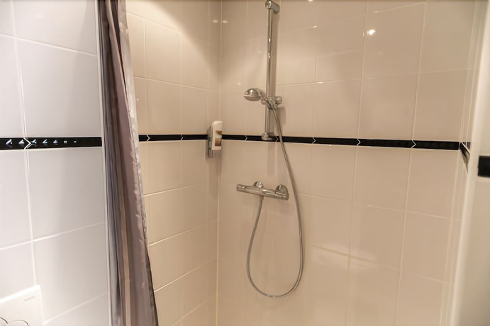 Imagen de la habitación del Hotel De La Bourse. Foto 15