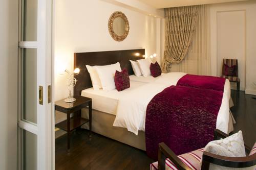 Imagen de la habitación del Hotel De La Cigogne, Ginebra. Foto 5