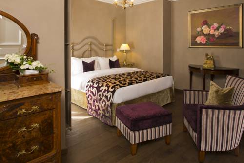 Imagen de la habitación del Hotel De La Cigogne, Ginebra. Foto 6