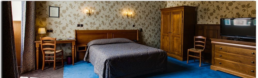 Imagen de la habitación del Hotel De La Cloche, Beaune. Foto 4