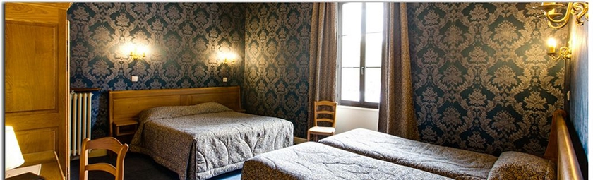 Imagen de la habitación del Hotel De La Cloche, Beaune. Foto 5