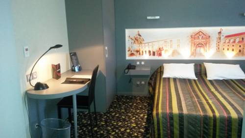 Imagen de la habitación del Hotel De La Cloche. Foto 5