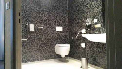 Imagen de la habitación del Hotel De La Cloche. Foto 6