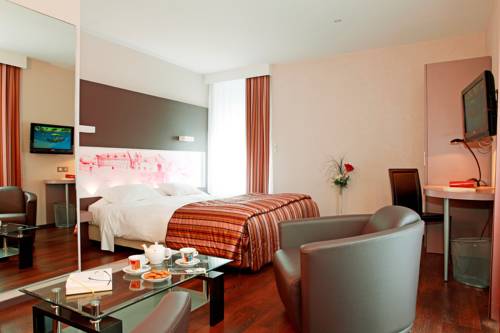 Imagen de la habitación del Hotel De La Cloche. Foto 12