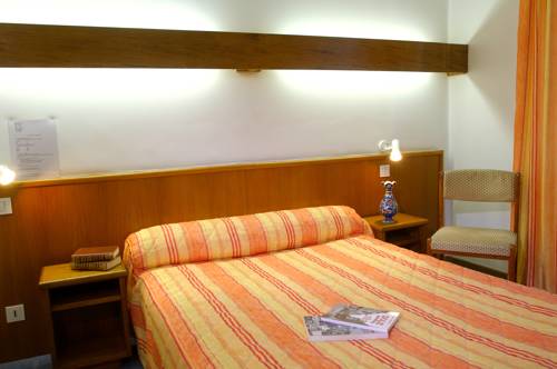 Imagen de la habitación del Hotel De La Cloche. Foto 13