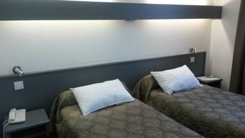 Imagen de la habitación del Hotel De La Cloche. Foto 15