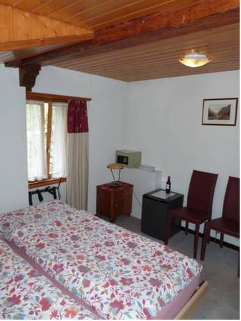 Imagen de la habitación del Hotel De La Dent-du-midi. Foto 9