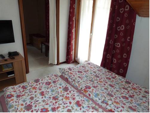 Imagen de la habitación del Hotel De La Dent-du-midi. Foto 11