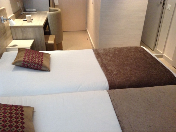 Imagen de la habitación del Hotel De La Fontaine. Foto 7