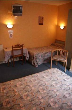 Imagen de la habitación del Hotel De La Gare, Dol de Bretagne. Foto 6