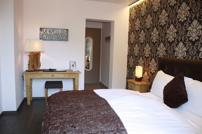 Imagen de la habitación del Hotel De La Gare, Monthey. Foto 4