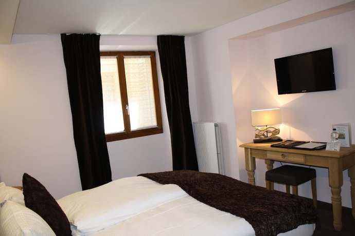 Imagen de la habitación del Hotel De La Gare, Monthey. Foto 5
