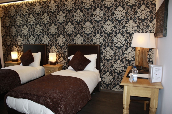 Imagen de la habitación del Hotel De La Gare, Monthey. Foto 6