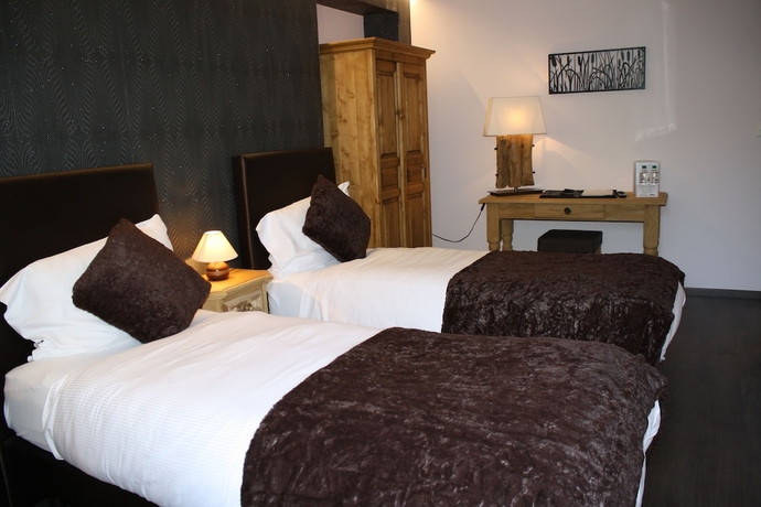 Imagen de la habitación del Hotel De La Gare, Monthey. Foto 7