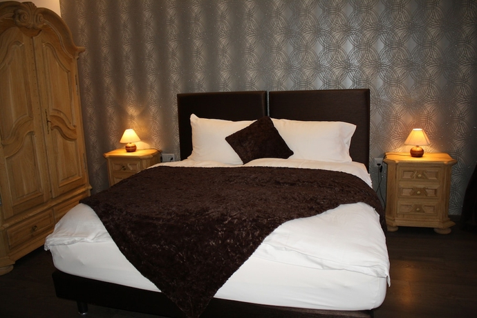 Imagen de la habitación del Hotel De La Gare, Monthey. Foto 10