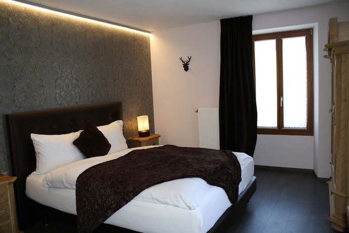 Imagen de la habitación del Hotel De La Gare, Monthey. Foto 12