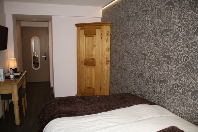 Imagen de la habitación del Hotel De La Gare, Monthey. Foto 14