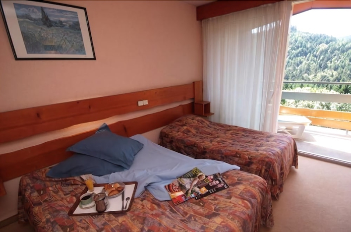 Imagen de la habitación del Hotel De La Grande Cascade. Foto 2