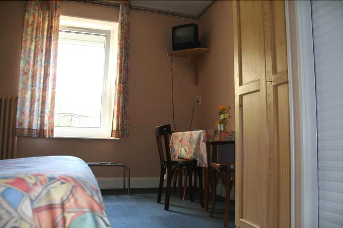 Imagen de la habitación del Hotel De La Grande Cascade. Foto 11